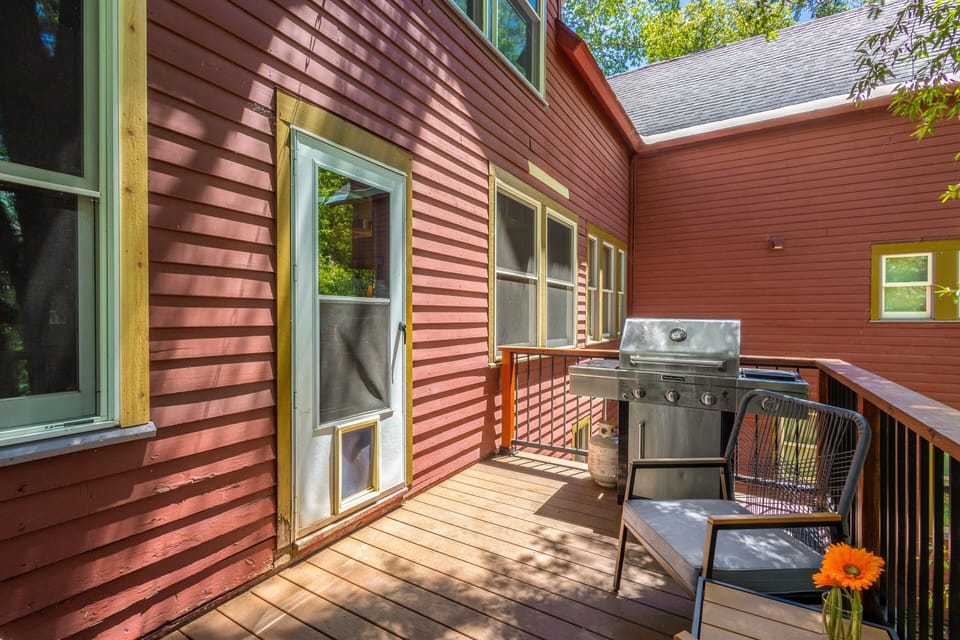 Gas grill on private deck.