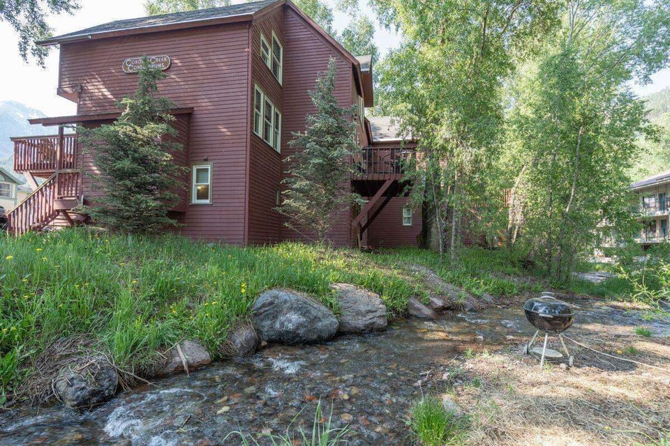Enjoy a charming view of the unit from the creek below.