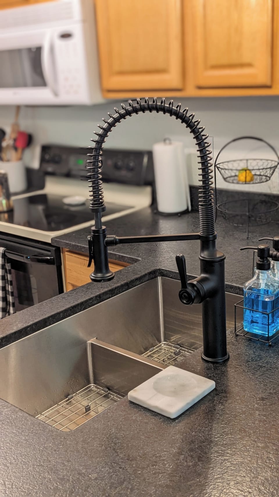 Recent kitchen renovations - textured granite countertop & 10” deep double sink 