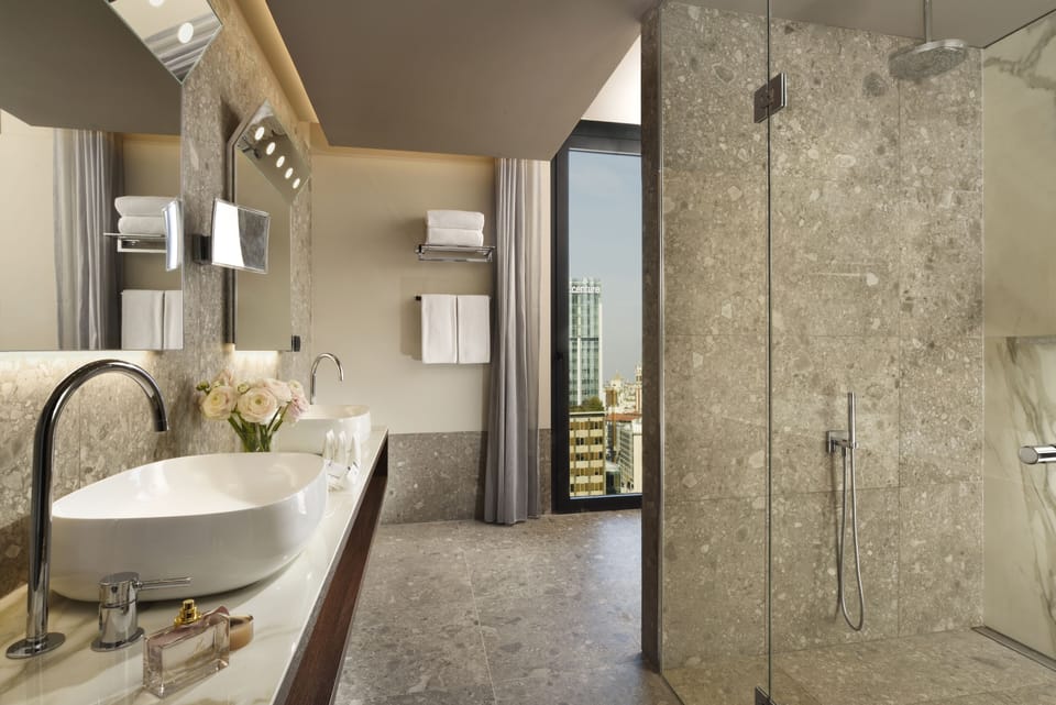 Hair dryer, slippers, bidet, towels