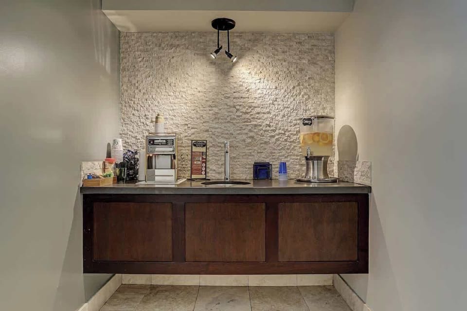 Lavazza Espresso Bar, with Teas and Fresh fruit or mint infused purified water. 