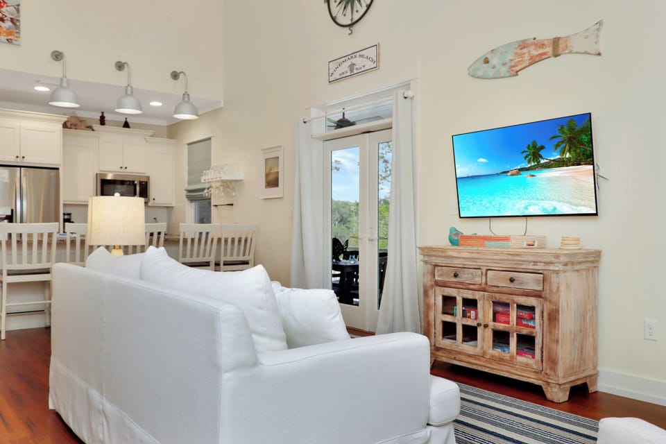 Living Room with TV and Screened Porch