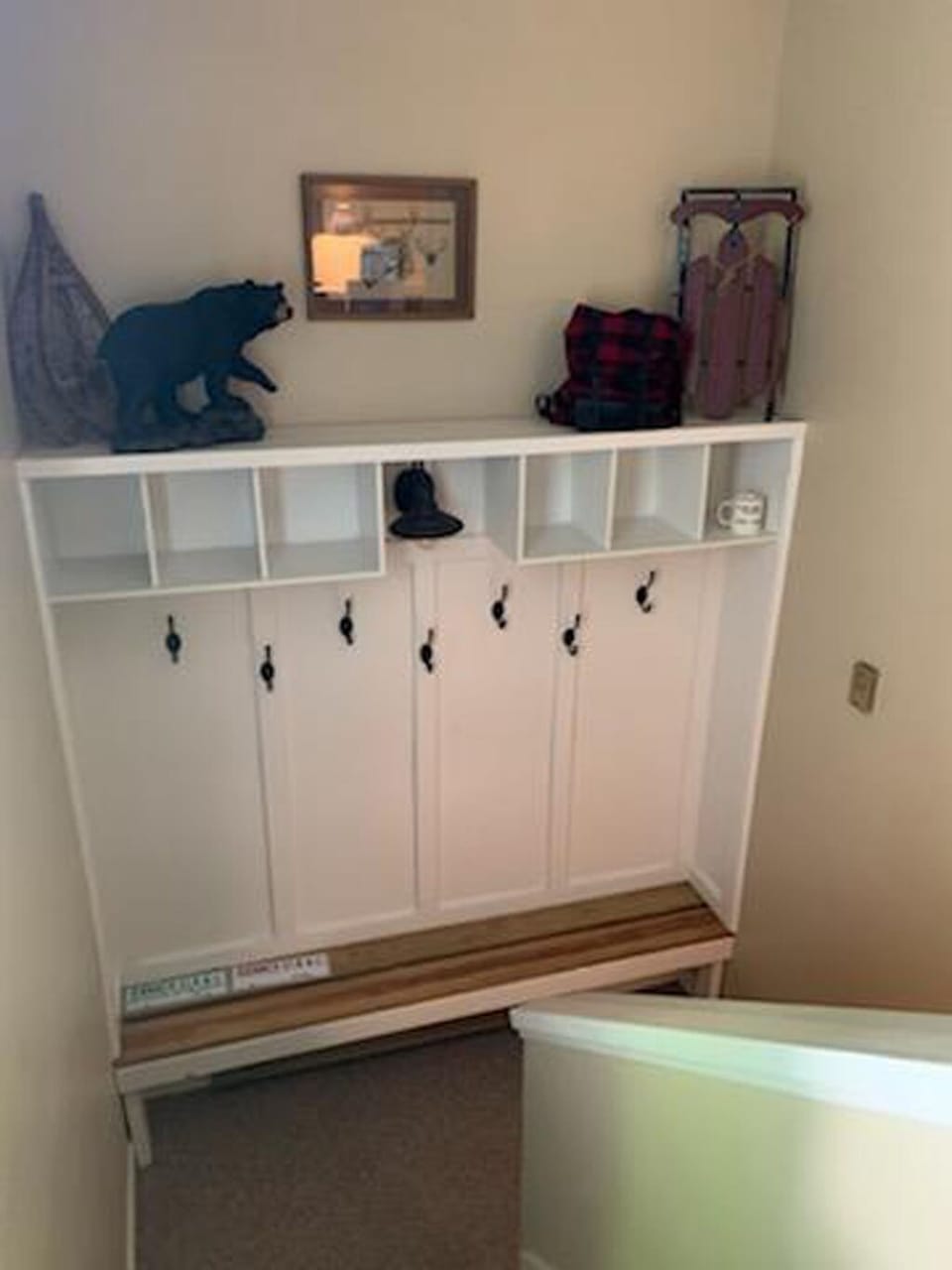 The baseboard heater on the landing gets your winter gear warm & cozy.