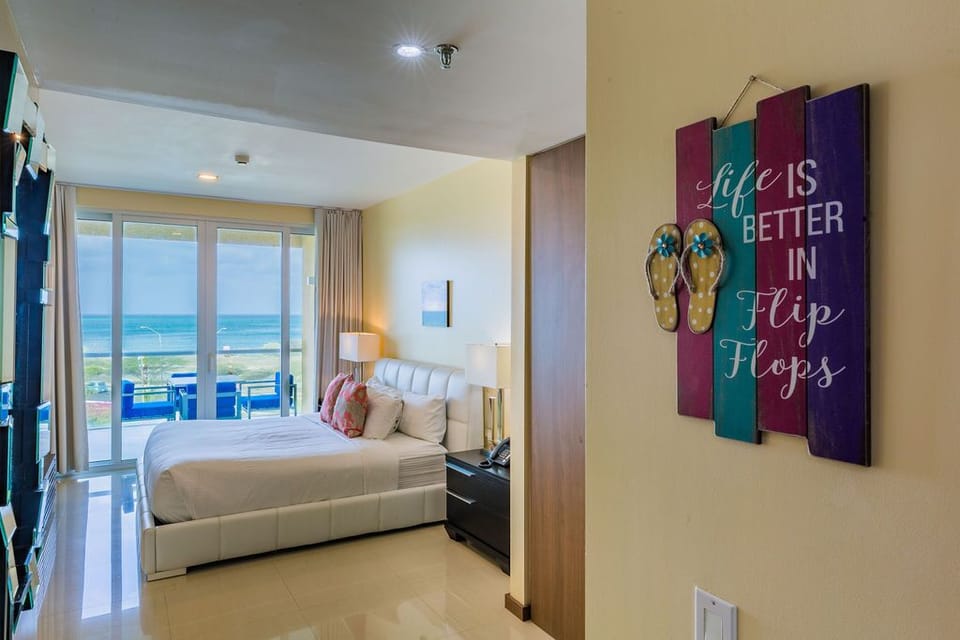 Master bedroom w/ balcony access