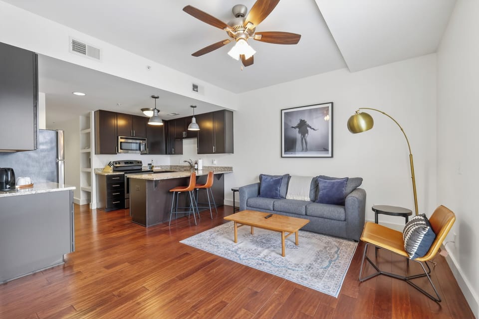 Open floor plan with stocked kitchen