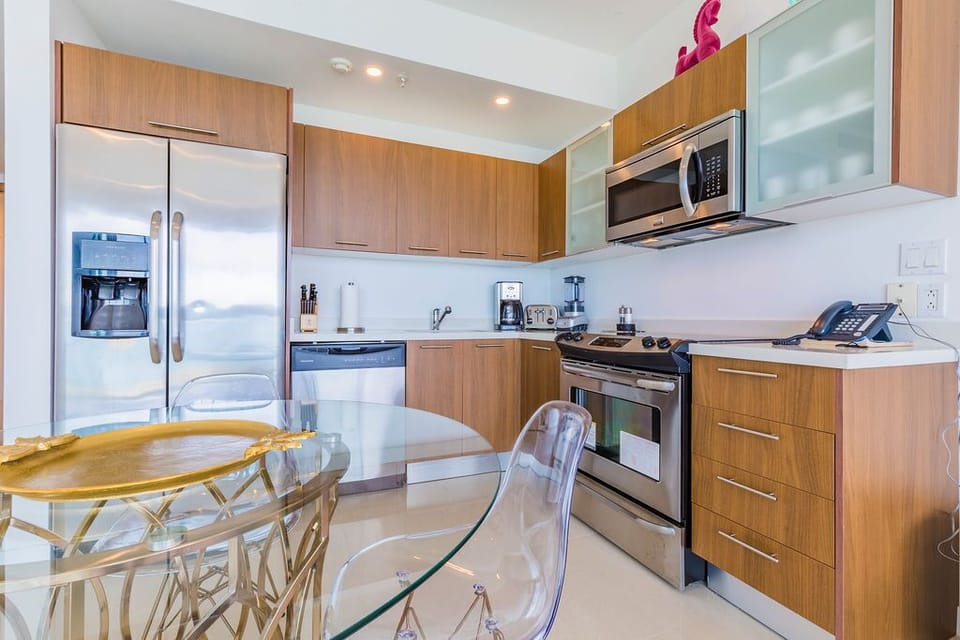Your modern kitchen offers sleek cabinetry, stainless appliances, and a cozy dining nook—perfect for preparing meals and sharing conversations over morning coffee.