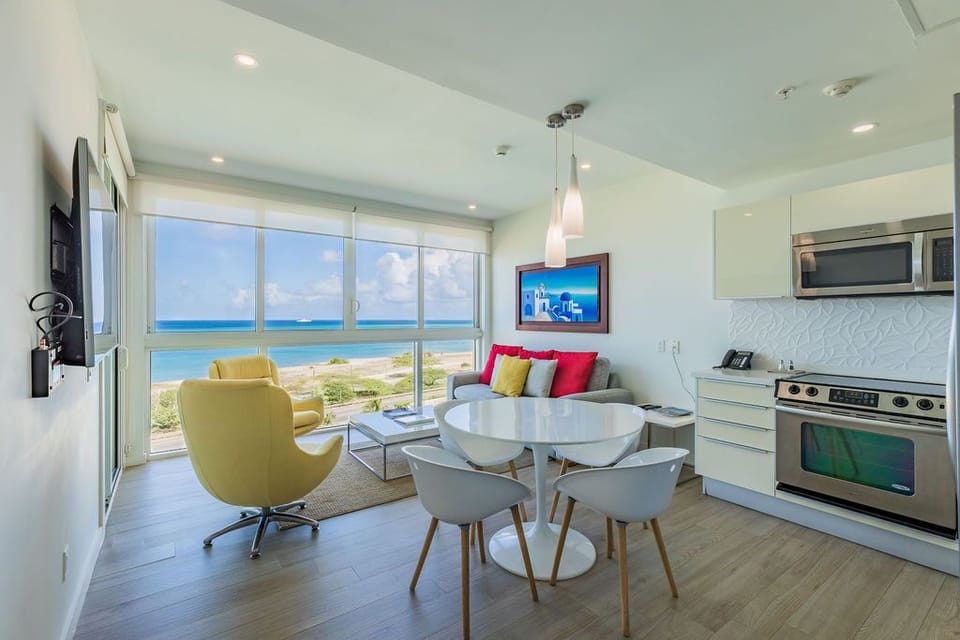 Your beachfront retreat opens to breathtaking ocean views, with the soothing sound of waves right outside your door. The open design invites sea breezes through, creating a tranquil, sun-kissed space where you can unwind completely.