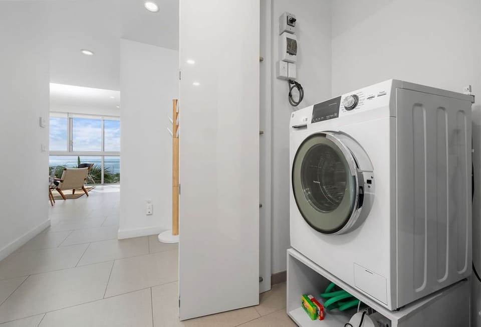 Your in-unit washer and dryer make packing light a breeze, with ocean breezes and bright natural light just steps away from your laundry space.
