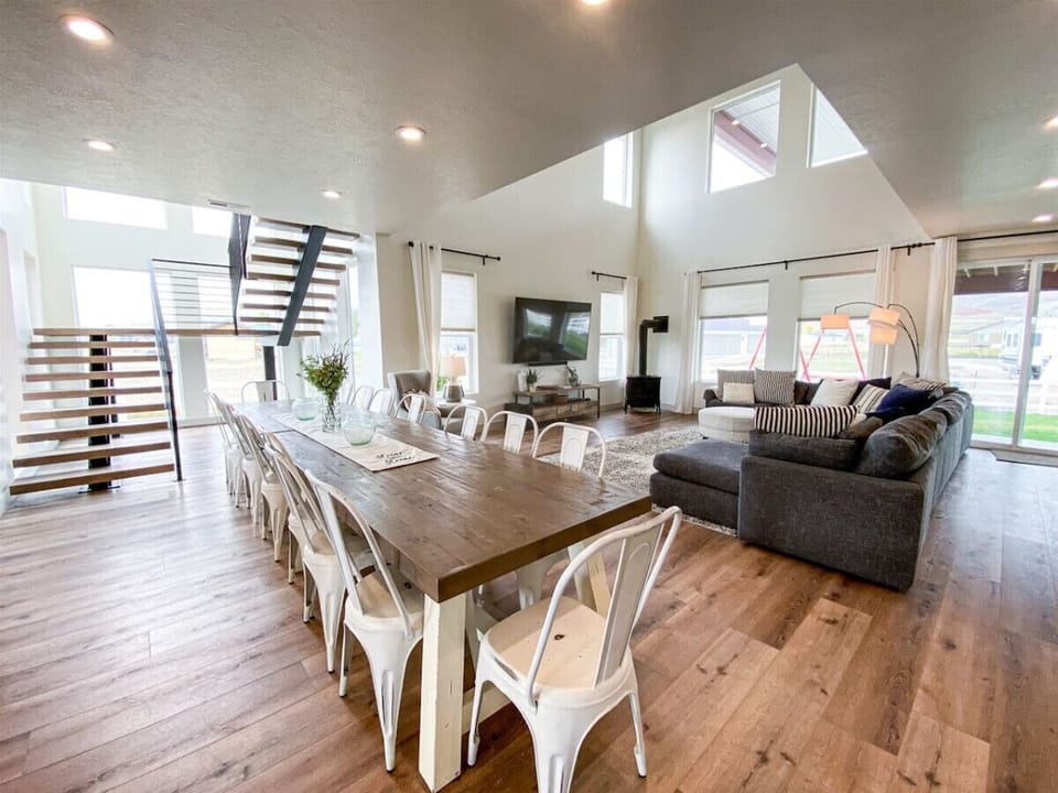 Spacious open-concept dining and living area, perfect for gathering, dining, and making lasting memories.