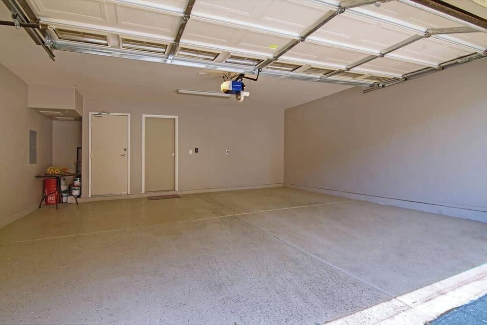 The 2 car garage has direct condo access.