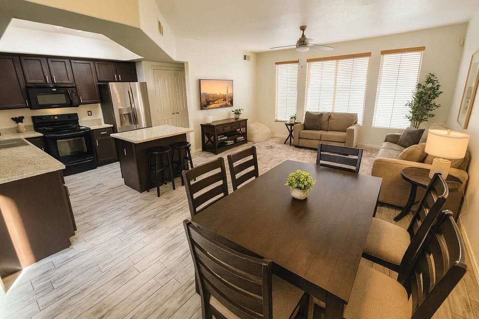 Bright and welcoming main level with modern updates, comfortable seating, and room for everyone to dine and unwind.