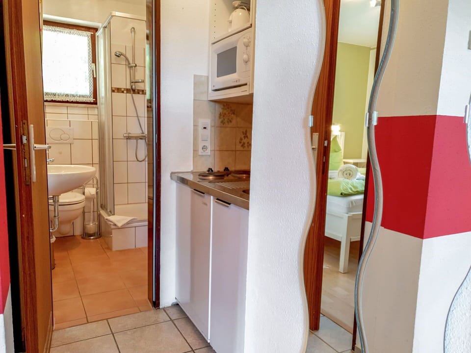 Property, Furniture, Wood, Interior Design, Floor, Flooring, Lamp, Door, Comfort, House