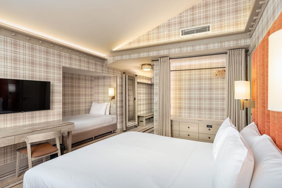 Pillowtop beds, minibar, in-room safe, desk
