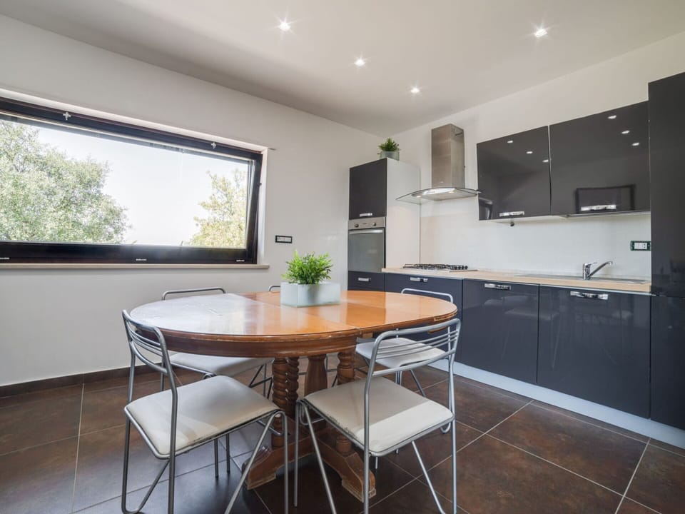 Villa | Private kitchen | Stovetop, dishwasher