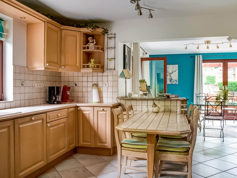 Villa | Private kitchen | Fridge, highchair