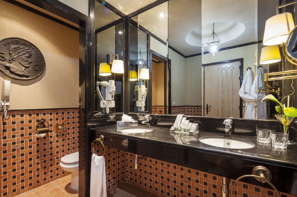 Eco-friendly toiletries, hair dryer, towels