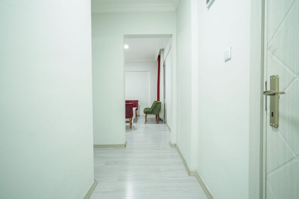 Quadruple Room | Bathroom | Shower, slippers, towels