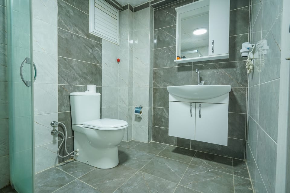 Shower, slippers, towels