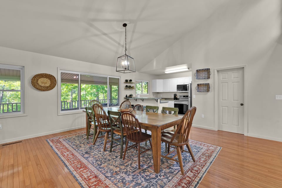 Seating for 10 at the dining table, and 3 counter stools at the bar. 