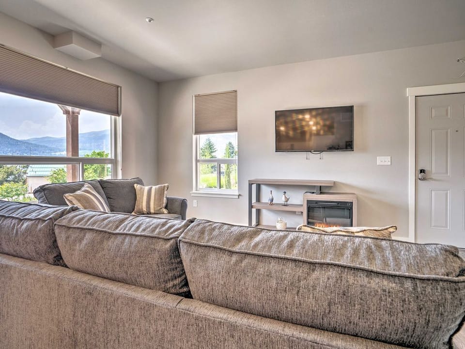 Turn on the flat-screen Smart TV while warming up by the fireplace.