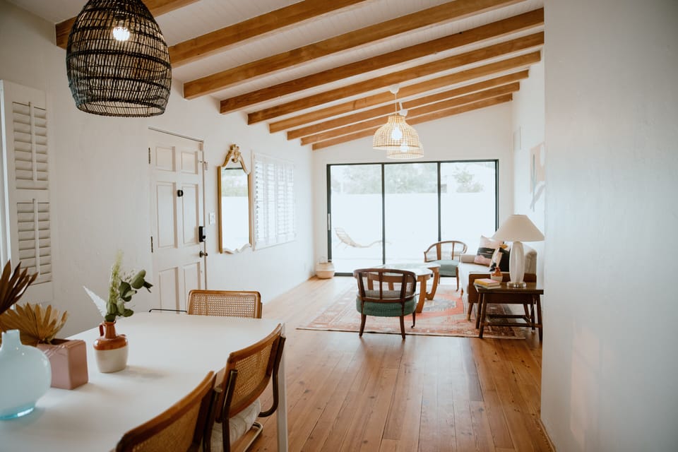 Dining, living and access to the pool through the slider.