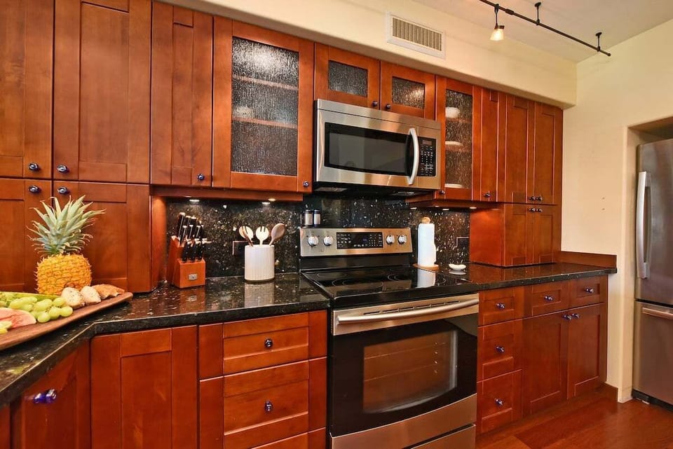 Enjoy cooking your favorite meal in your fully furnished kitchen with stainless steel appliances