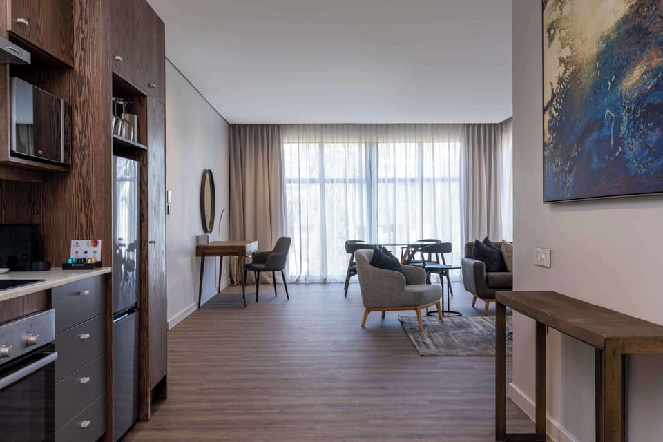 Apartment, 2 Bedrooms (Boutique Building) | Private kitchen | Mini-fridge, microwave, dishwasher, coffee/tea maker