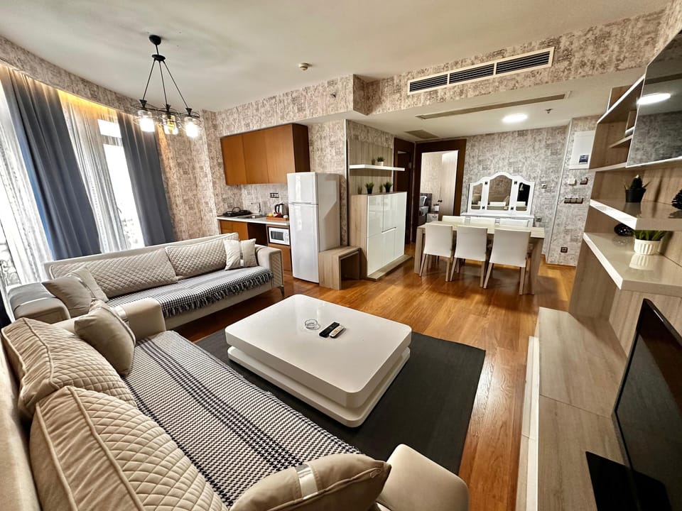 Family Room, Multiple Beds, 2 Bathrooms | Living area | 45-inch TV with satellite channels