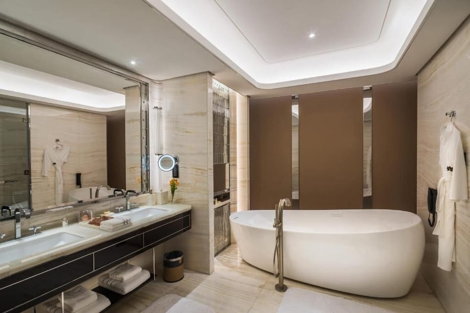 Rainfall showerhead, slippers, towels