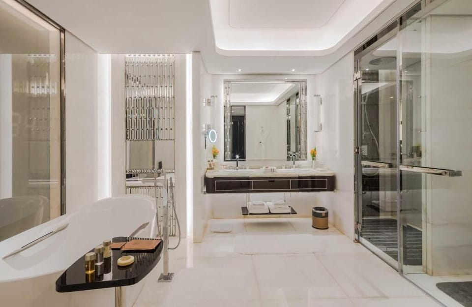 Rainfall showerhead, slippers, towels