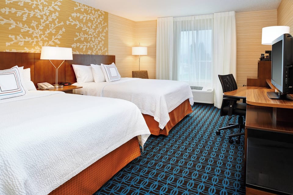 Room, 2 Queen Beds | Premium bedding, desk, iron/ironing board, free cribs/infant beds