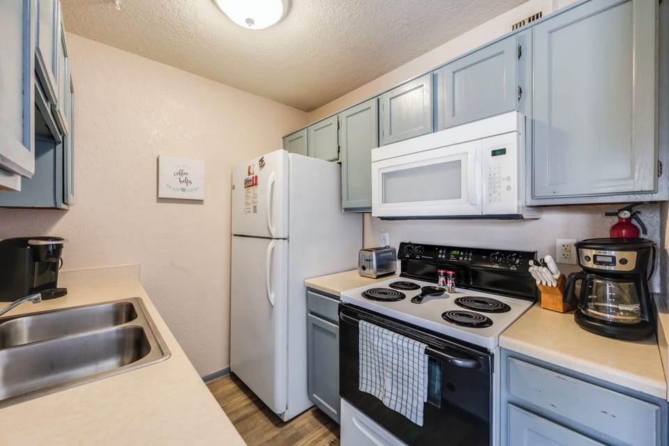 Your fully equipped kitchen awaits with everything needed to create delicious meals during your stay.