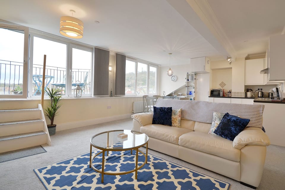 Spacious living room with large picture windows