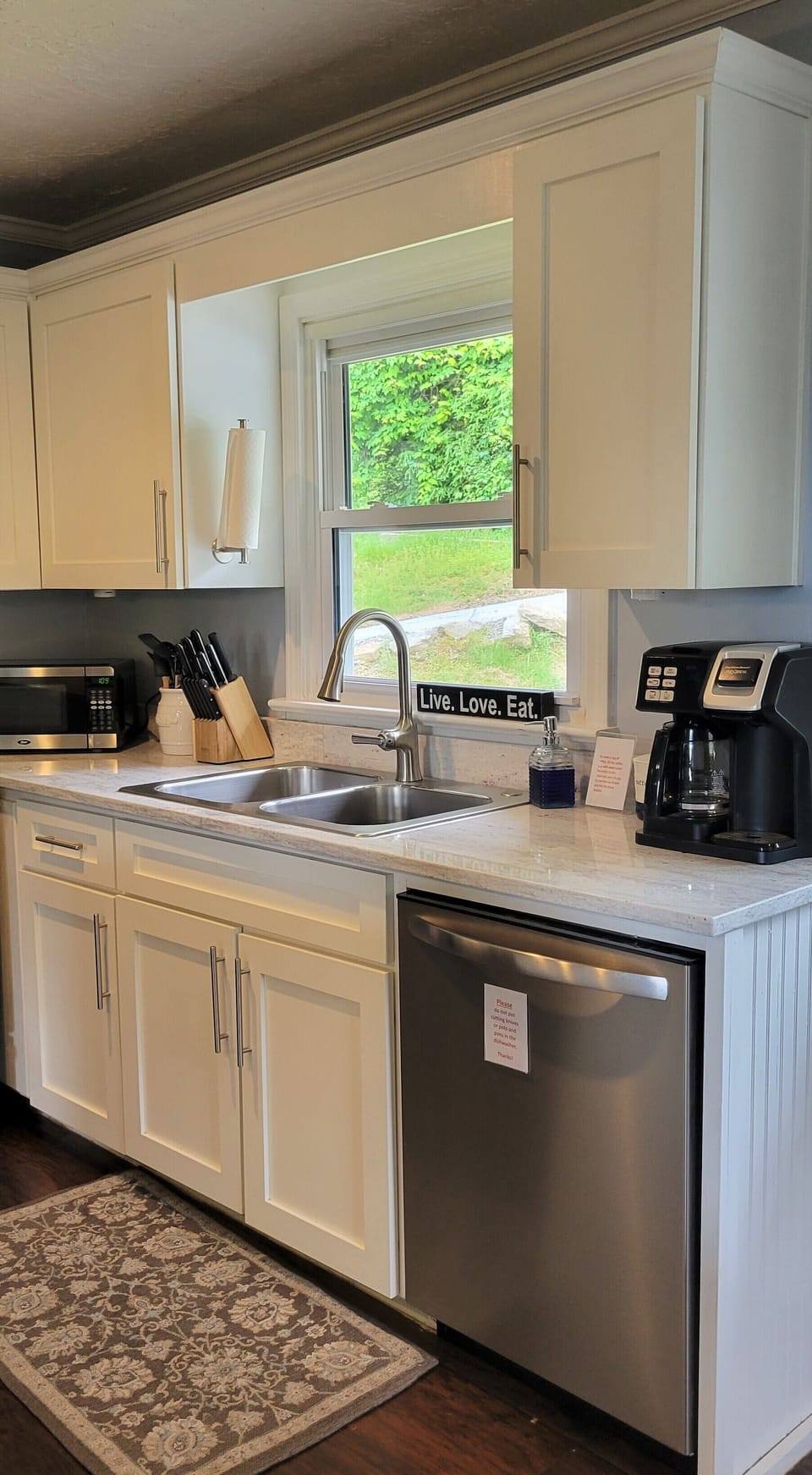 Updated cabinetry and granite countertops.
