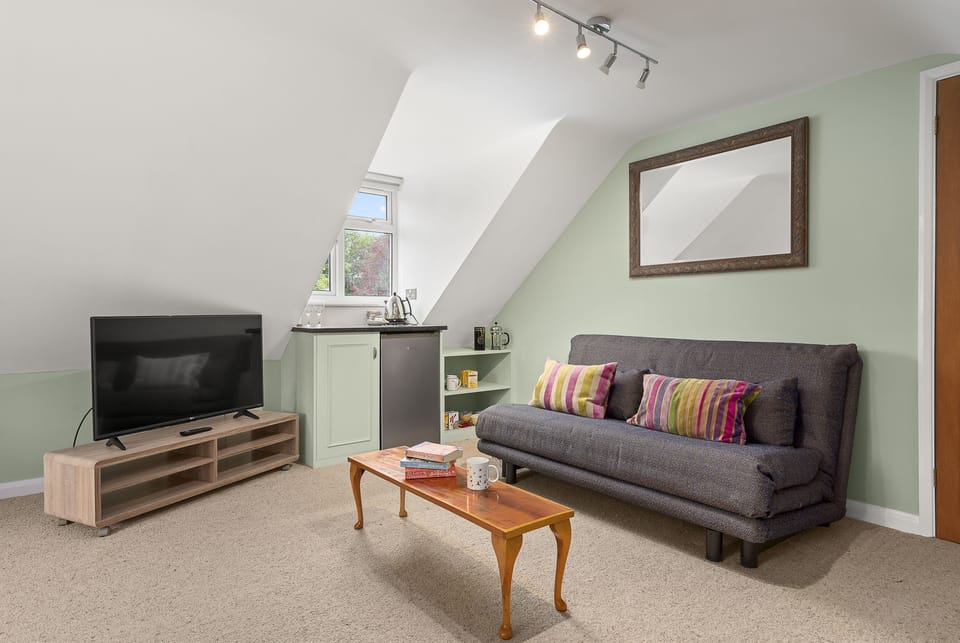 Premium Suite, Private Bathroom, Garden View | Room amenity