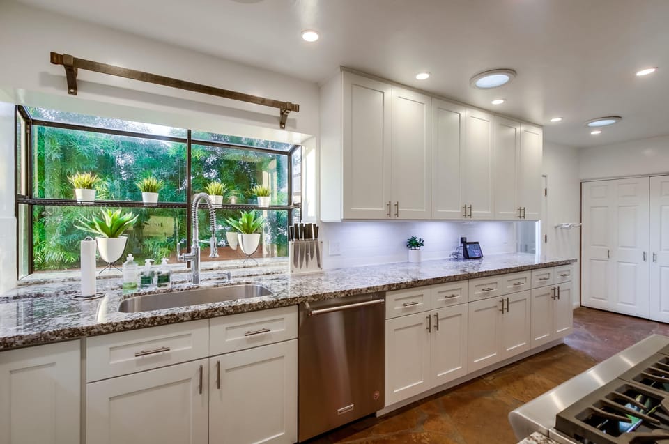 An open, well-organized kitchen with generous workspace.