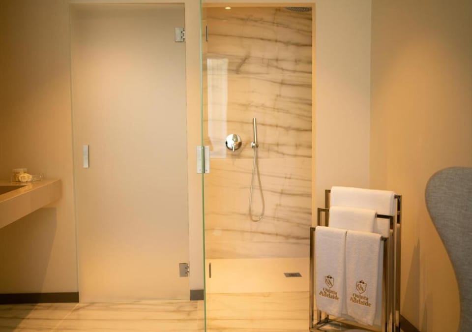 Shower, bathrobes, towels