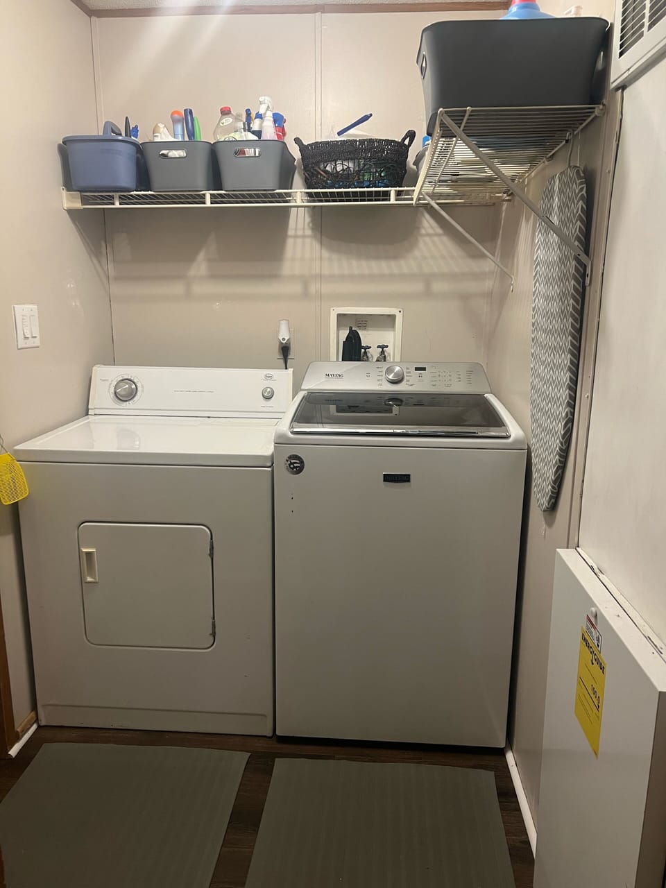 Laundry room with full size washer and dryer for guests 