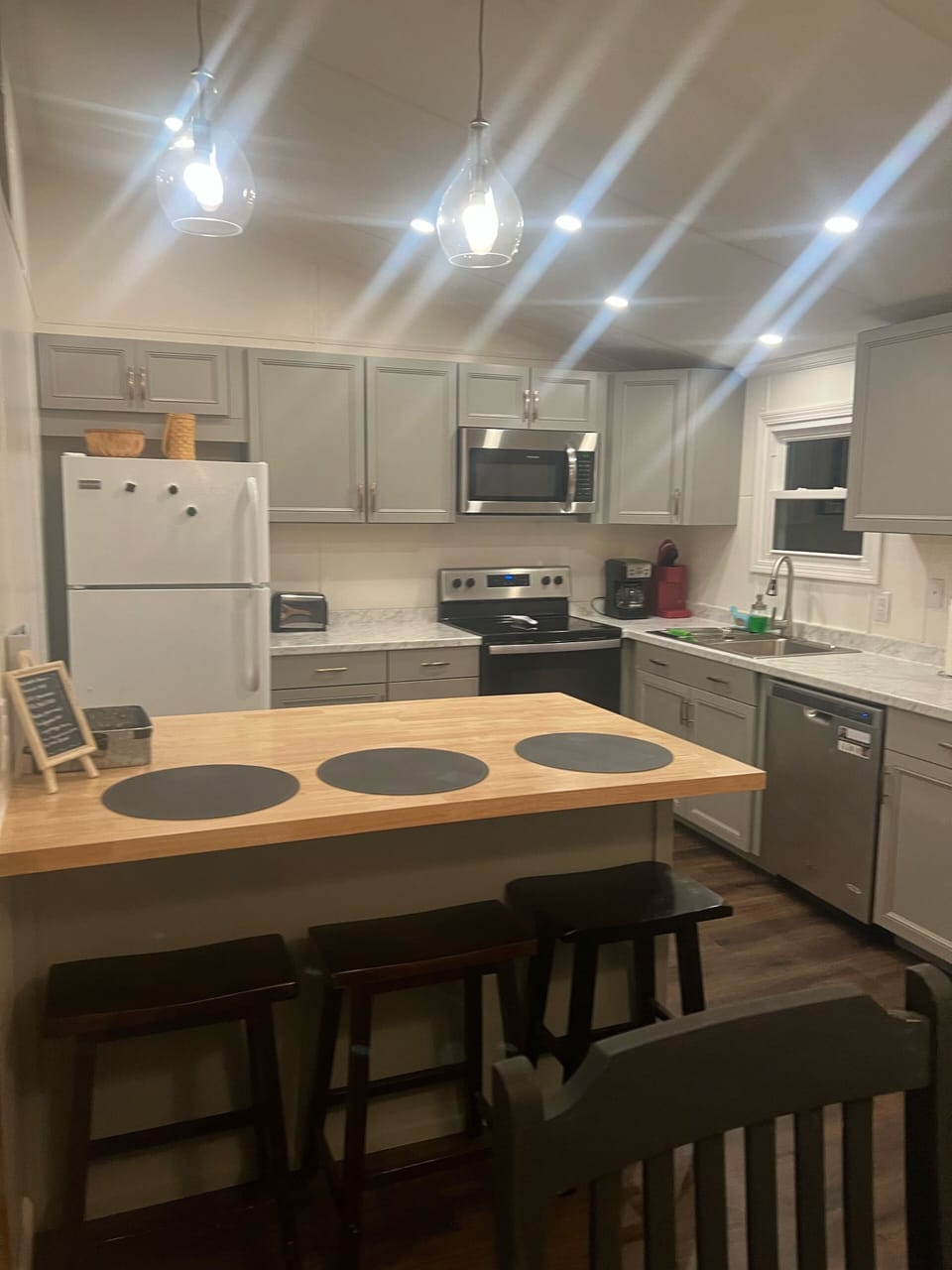 Beautiful kitchen stocked with all the gadgets and kitchenware you need