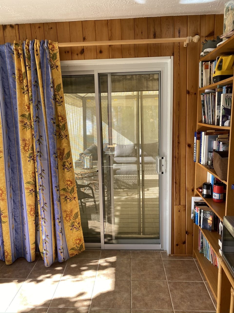 Mudroom looking into screened-in deck