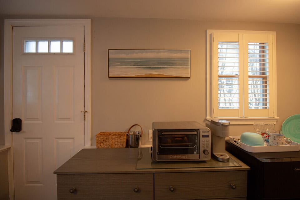 Dedicated coffee station, toaster oven, and mini fridge.