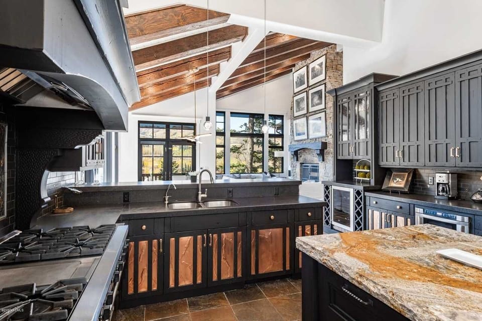 chef kitchen with two dishwashers, WOLF stoves, griddle, ovens (2) and sub zero 