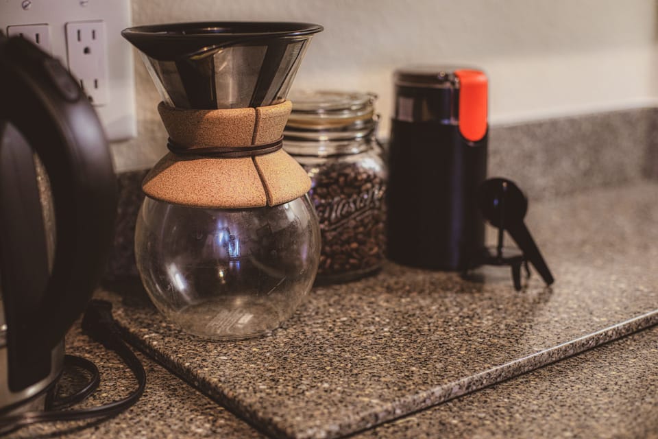 Coffee station with whole beans, grinder, and pour-over