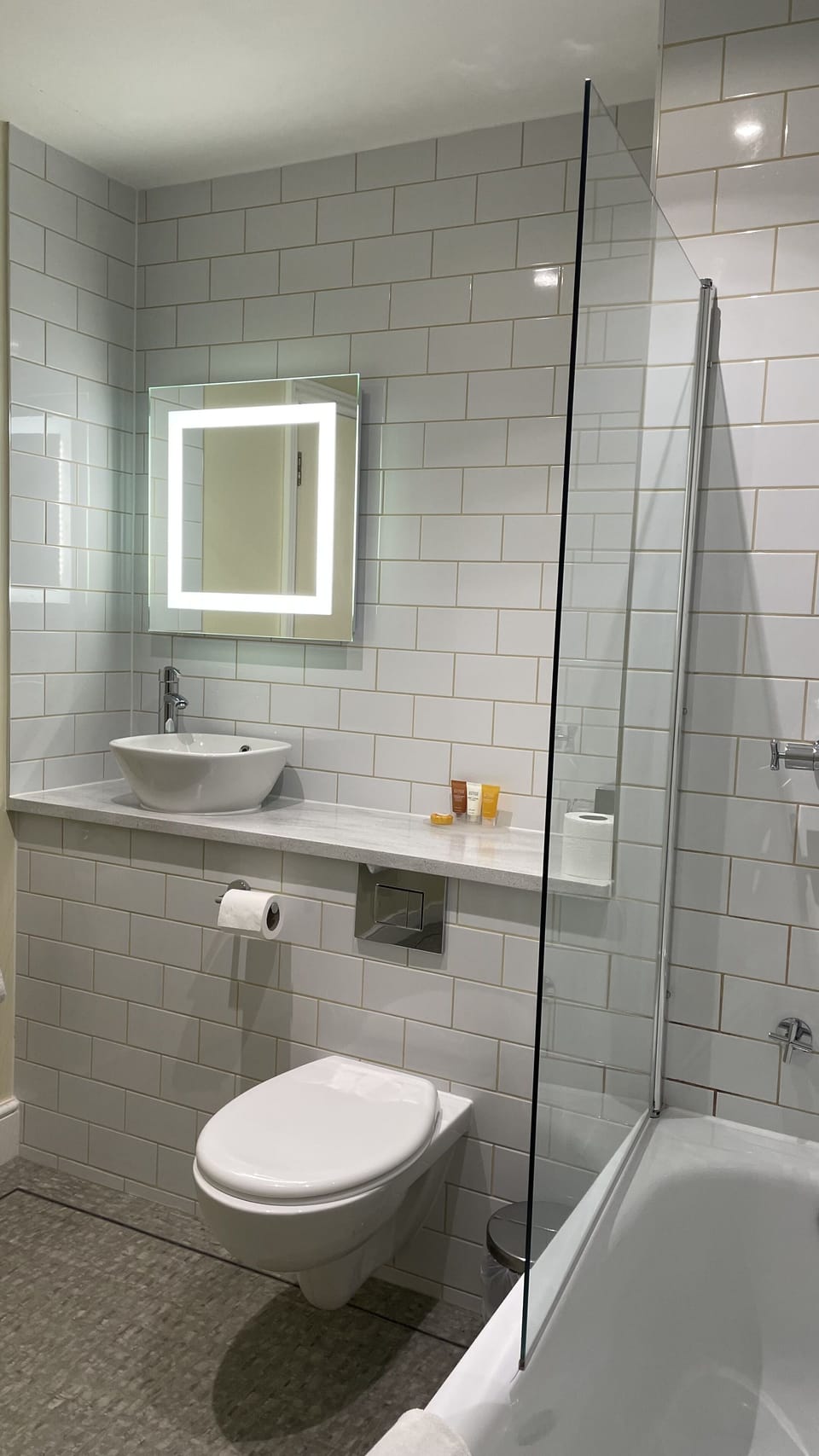Combined shower/tub, hair dryer, towels, soap
