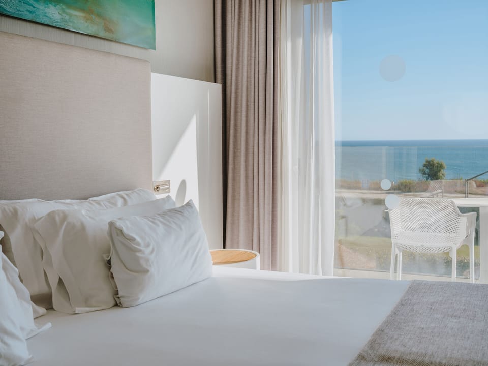 Double Room, Partial Sea View | Premium bedding, down comforters, minibar, in-room safe