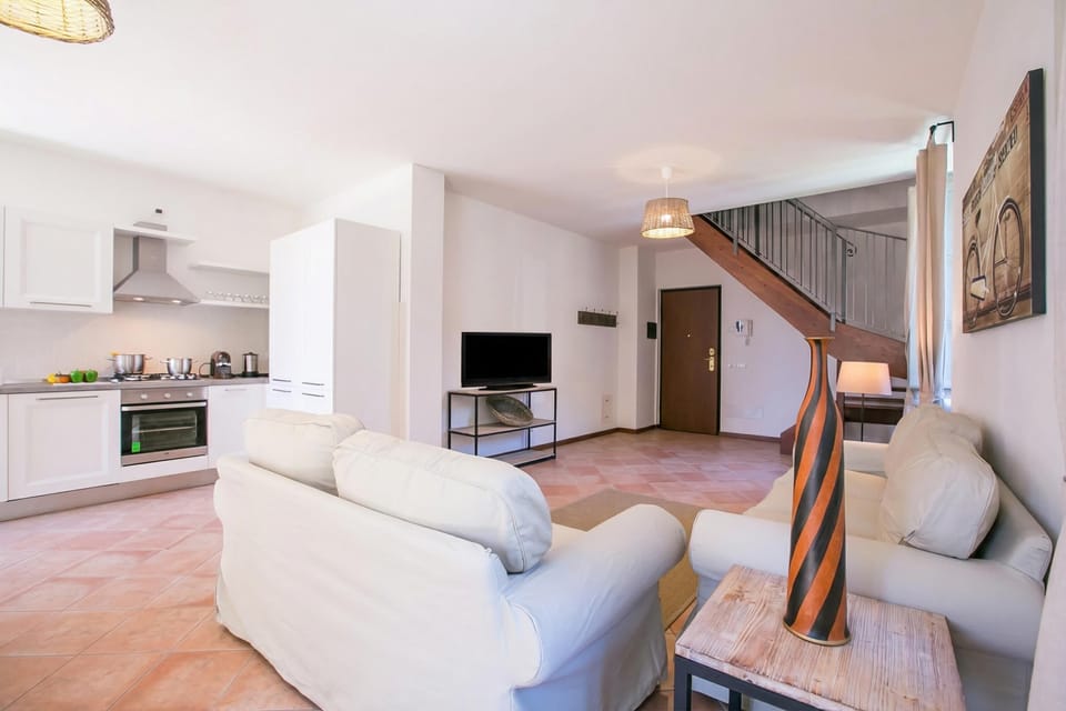 Family Apartment, Multiple Bedrooms (Casa Al Prato Apt. G) | Living area | 24-inch flat-screen TV with digital channels, TV, heated floors