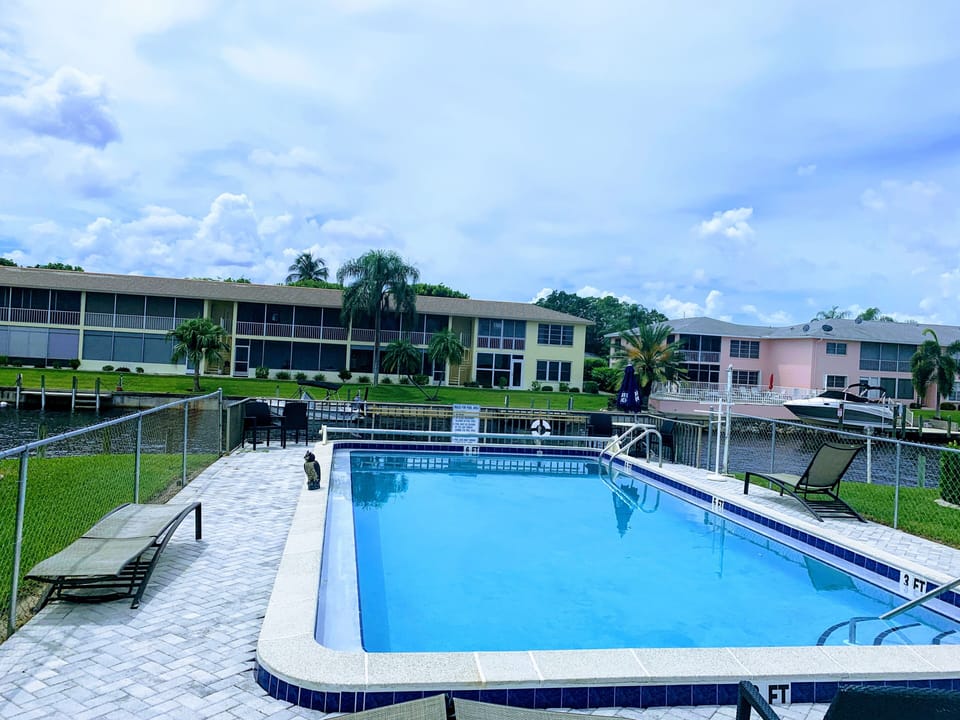 watch boats go by as you enjoy the heated pool