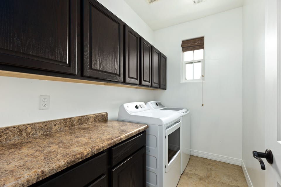 Large laundry room with detergent available for your stay!