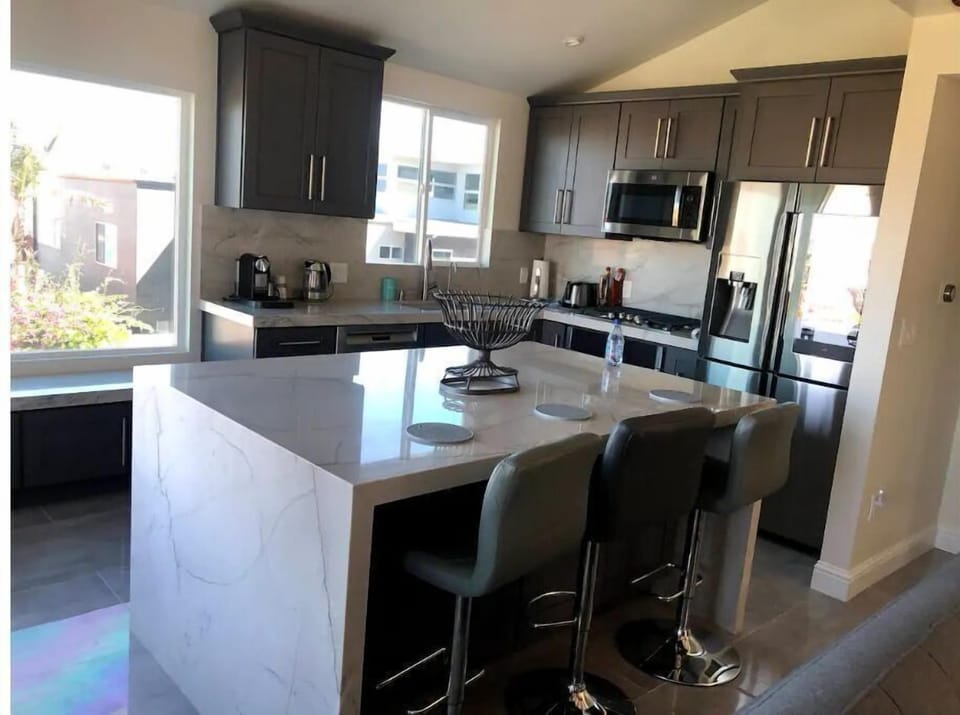 Modern new fully equipped kitchen with new high end appliances 