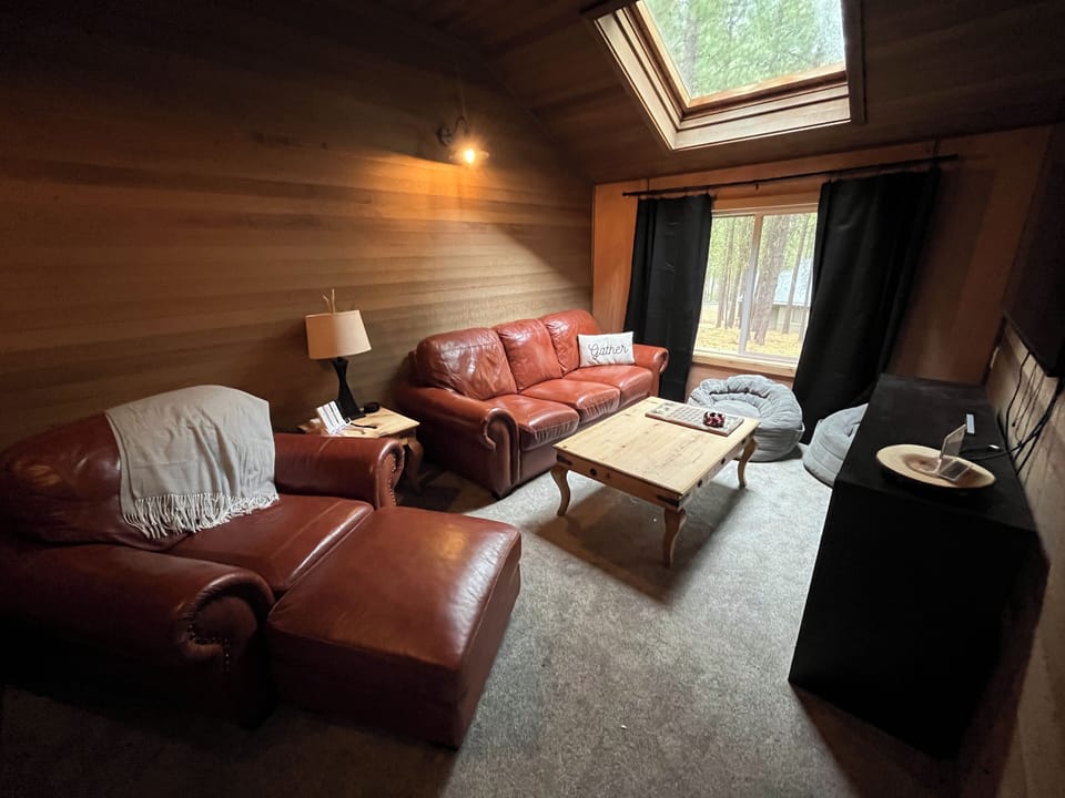 Newly added cozy den space with gorgeous forest view.